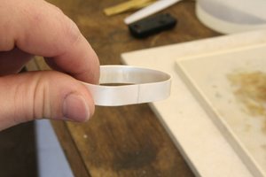 sterling silver bangle ready for cleaning with pumice powder