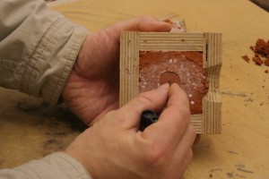 making a hole in the top casting imprint